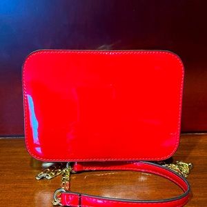 Red patent leather style mini bag with shoulder strap